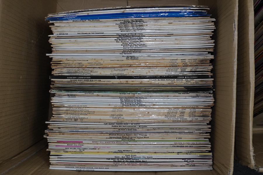 Two boxes of LP record albums, including some compilations, comedy, etc., artists include; Adam Faith, Gino Washington, Joe Cocker, the Goons, Spike Milligan, Che Atkins, Duane Eddy, Floyd Cramer, the Shadows, etc. Condi